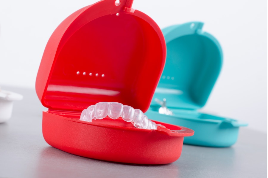 ClearCorrect clear aligners in colorful cases