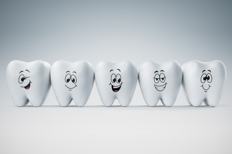 Graphic with a row of smiling teeth.
