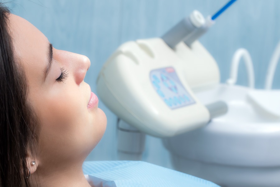 Woman relaxing in the dental chair after oral conscious sedation